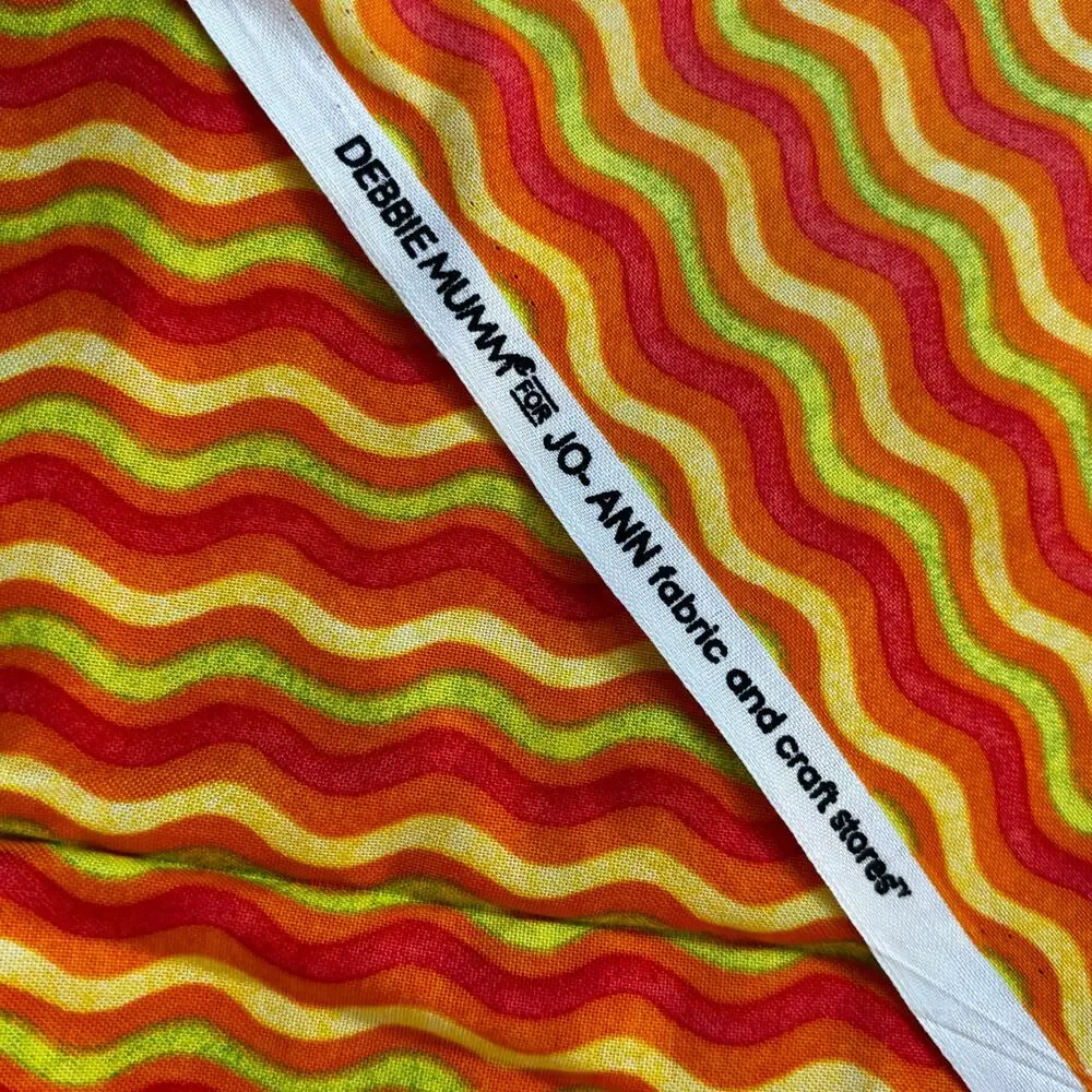 Debbie Mumm fabric remnant for Joann’s Fabrics bright orange yellow wavy stripes
